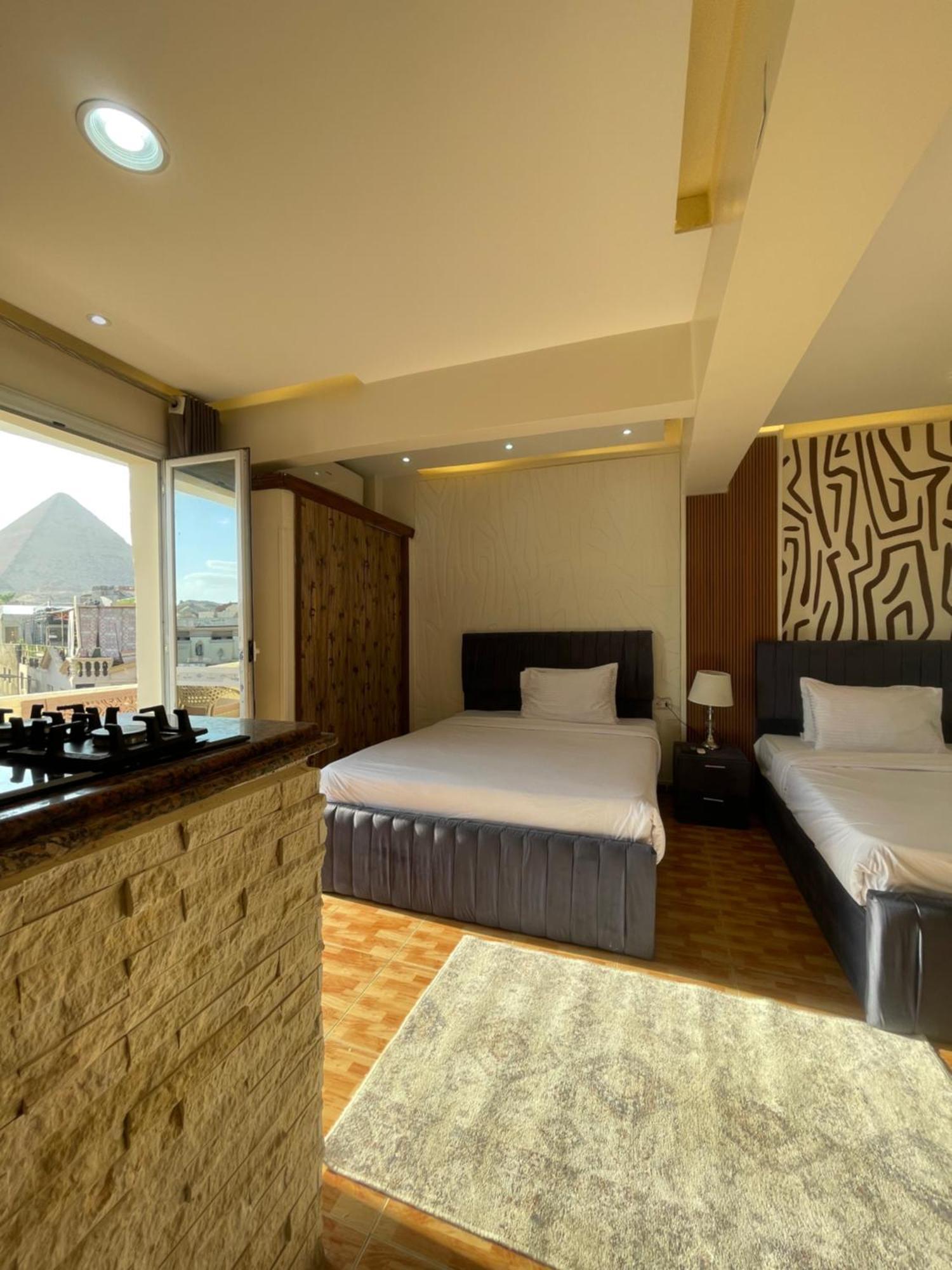 Kafret el-Gabal Cheops Pyramids Inn מראה חיצוני תמונה